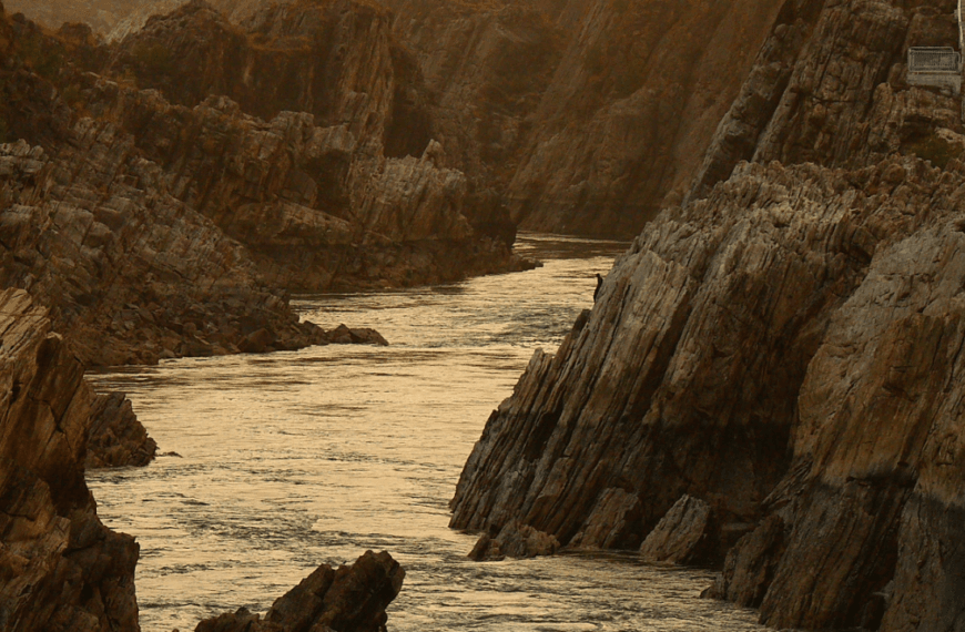 Why Narmada River flows in west direction